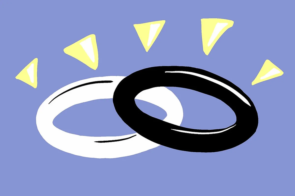 Illustration of a black ring and a white ring linked together