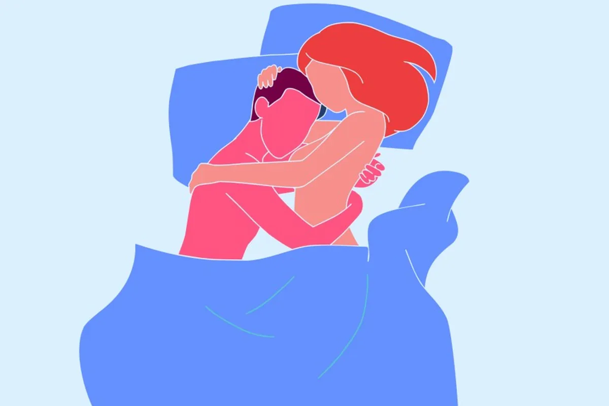 Illustration of a couple cuddling under a blue blanket