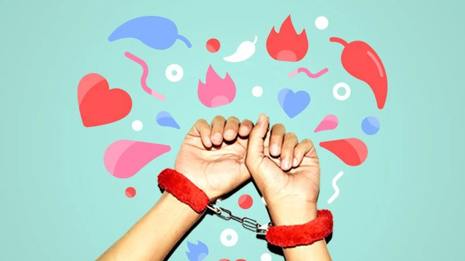 Wrists in red fluffy handcuffs against a mint background with illustrated hearts and flames
