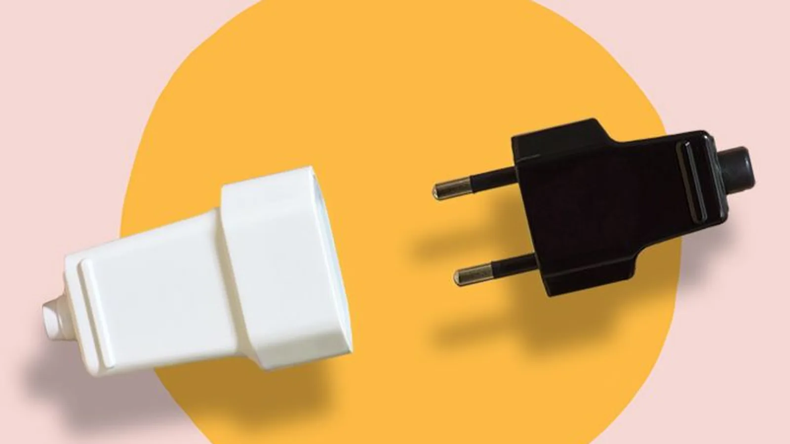 Illustration of a white plug and a black plug facing each other on an orange circle